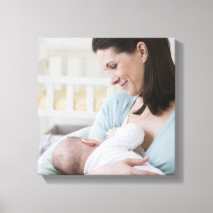 Mother breastfeeding baby canvas print