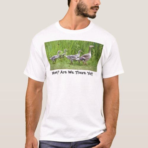 Mother goose leading goslings in the wild T_Shirt