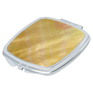 Mother of pearl tones gold mirror for makeup