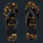 Mother of the Bride Luxury Black & Gold Foliage Flip Flops<br><div class="desc">These gorgeous Mother of the Bride Luxury black and gold foliage flip flops boasts a luxurious black and gold palette, with a stunning golden floral pattern and modern typography set against a black background, exuding elegance and sophistication. It's a beautiful gift for your bridal party. View the collection on this...</div>
