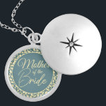 Mother of the Bride with Blue and Cream Leaves Locket Necklace<br><div class="desc">This beautiful locket is a special accessory designed for the Mother of the Bride. The locket features a classic blue and cream color scheme with a cream-colored leaf pattern inside, adding a touch of elegance and natural beauty. The hidden message inside is a special touch that will make this locket...</div>