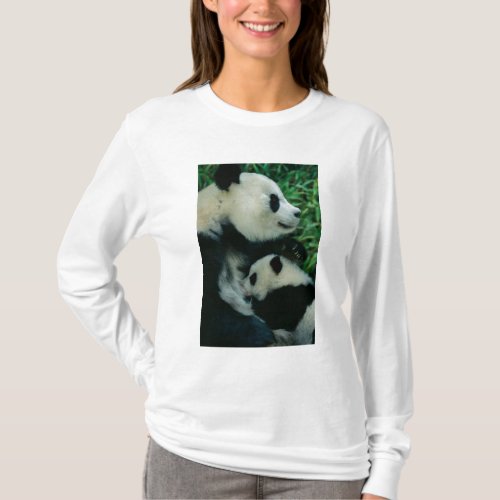 Mother panda nursing cub Wolong Sichuan China T_Shirt