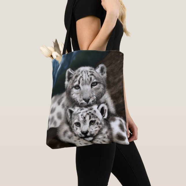 Mother Snow Leopard and Cub in the Mountains Tote Bag (Close Up)