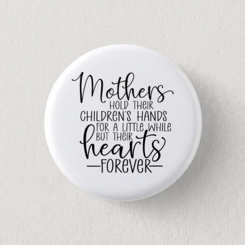 Mothers hold their childrens hand for a little wh button