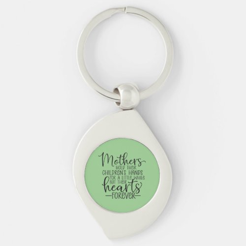 Mothers hold their childrens hand for a little wh keychain