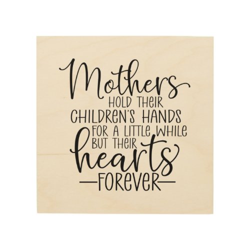 Mothers hold their childrens hand for a little wh wood wall art
