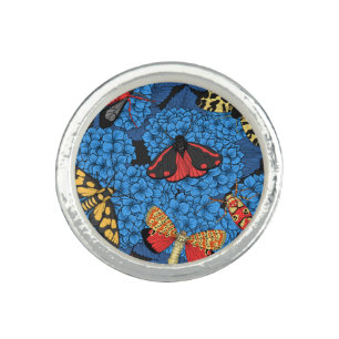 Moths on blue hydrangea ring