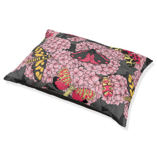 Moths on pink hydrangea pet bed
