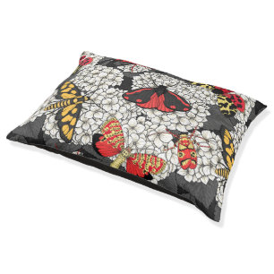 Moths on white hydrangea pet bed