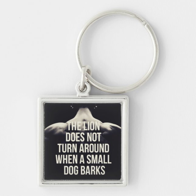 Motivational Words - The Lion Does Not Turn Around Keychain (Front)
