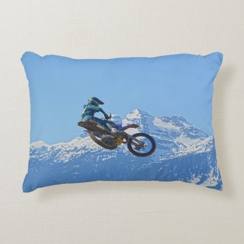 Motocross Rider Flying over Mountain Accent Pillow