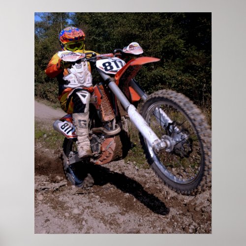 Motocross rider pulling a wheelie poster