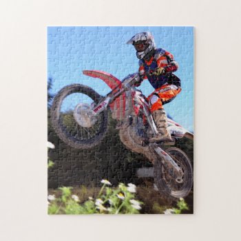 Motocross Rider Taking The Jump Jigsaw Puzzle by McPhotoPosters at Zazzle