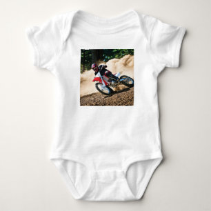 Motocross rider throw pillow baby bodysuit
