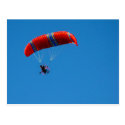Motor Paraglider on Blue Sky