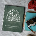 Mountain Adventure Begins Green Chalkboard Wedding Planner<br><div class="desc">Plan your dream wedding amidst the enchanting beauty of nature with our Mountain Adventure Begins Green Chalkboard Wedding Planner! Crafted with a captivating logo featuring majestic mountains, graceful palm trees, and a heart symbol, accompanied by the elegant quote 'And So Our Adventure Begins' in white typography, this planner sets the...</div>