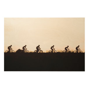 Mountain Bike Riders Make Their Way Over The Dam Wood Wall Art