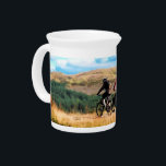 MOUNTAIN BIKING DRINK PITCHER<br><div class="desc">A watercolor a of three men mountain biking in the Welsh hills.</div>