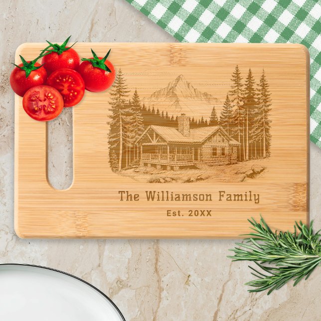Mountain Cabin Personalized Family Name Engraved Cutting Board (A personalized cutting board with picture of a country cabin in the mountains with pine trees)
