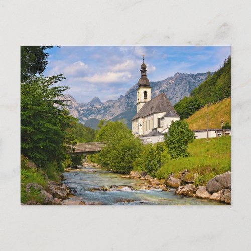 Mountain church with stream landscape postcard