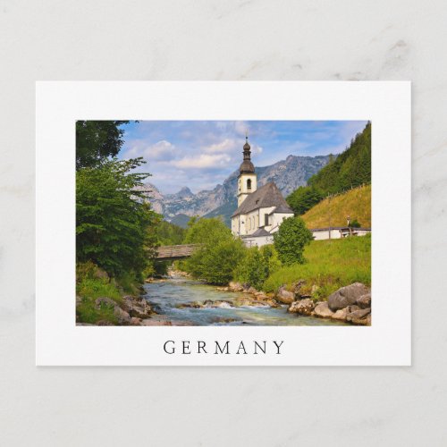 Mountain church with stream landscape postcard