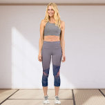 'Mountain ranges' violet Capri Leggings<br><div class="desc">Whether you enjoy the serenity of imaginging yourself on a mountaintop during yoga, or the whole-body challenge of running up a rugged hillside, these stylish leggings bring a sporty chic look to your workout. Splashes of a pink sunset are set against a violet and purple background. You'll get boho vibes...</div>