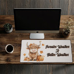 Mousepad Desk Mat<br><div class="desc">Elevate your workspace with this Cute Autumn Highland Cow desk mat, featuring an adorable highland cow surrounded by whimsical pumpkins. This fall-inspired desk mat adds a cozy and festive touch to your desk, perfect for those who love the charm of sweater weather. Offering plenty of space for your keyboard and...</div>