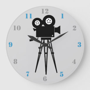 MOVIE CAMERA AND TRIPOD WITH GRAY AND BLUE NUMBERS LARGE CLOCK
