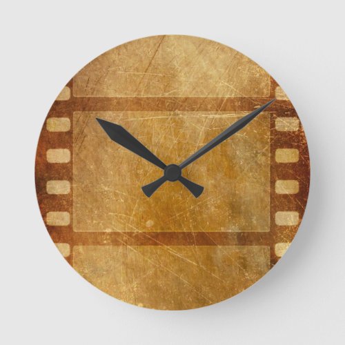 MOVIE REEL OLD_FASHIONED GRUNGE GOLD BACKGROUND DI ROUND CLOCK