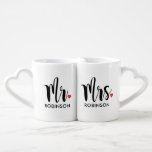 Mr and Mrs Black Modern Script Wedding Monogram Coffee Mug Set<br><div class="desc">Personalized monogram coffee mugs make a unique wedding gift for the new Mr and Mrs! This minimalist design features modern black script writing,  a red heart accent,  and custom text that can be personalized with the newlywed couple's married last name.</div>