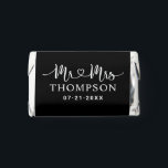 Mr and Mrs Black White Heart Script Custom Wedding Hershey's Miniatures<br><div class="desc">Elegant custom wedding Hershey's Chocolate Miniatures candy favors include a modern and minimal "Mr and Mrs" design in heart calligraphy script featuring a monogram of the married couple's last name and wedding date in stylish text that can be personalized. The back includes a simple and sweet thank you message to...</div>