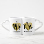 Mr and Mrs Gold Heart Custom Wedding Monogram Coffee Mug Set<br><div class="desc">Personalized monogram coffee mugs make a unique wedding gift for the new Mr and Mrs! This minimalist design features modern black script writing,  a gold heart background,  and custom text that can be personalized with the newlywed couple's married last name.</div>