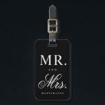 Mr. and Mrs. newly wed luggage tag<br><div class="desc">A modern,  fun luggage tag featuring large Mr. and Mrs. text and family name below in a mix of gender specific fonts. Perfect for newly weds and honeymooners.</div>