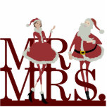 Mr & Mrs Claus Cake Topper Cutout<br><div class="desc">Adorn your Christmas wedding cake with this whimsical Mr. & Mrs. Santa Claus cake topper from Kustom By Kris. The happy holiday couple are dressed in their best holiday attire with a red-on-re theme.</div>