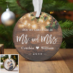 Mr Mrs First Christmas Rustic String Lights Photo Ornament<br><div class="desc">***** Don't forget to upload your favorite photo on the back. If you don't need the photo placement, you can remove it using design tool ***** Celebrate your First Christmas Married with this Rustic Wood Look String Lights Photo Ornament. Adding a favorite photo and text to this rustic design for...</div>