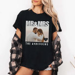 Mr & Mrs Photo Block Heart Anniversary Names Black T-Shirt<br><div class="desc">This "Mr. and Mrs." photo block t-shirt features a stylish design with a customizable photo block, perfect for capturing a special memory. Ideal for newlyweds, wedding anniversary celebrations, or bridal showers, it offers a personalized touch to your wardrobe. Great for couples, this t-shirt adds a fun and unique twist to...</div>