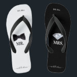 Mr. & Mrs. Wedding Black & White Flip Flops<br><div class="desc">An elegant black and white wedding themed design perfect for newlyweds or the bridal party. The flip flop sandals are designed in black and white with a stylish black bow tie for the "Mr." and a beautiful sparkling diamond for the "Mrs." The established date is located on top which can...</div>