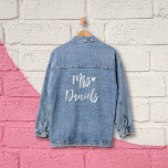 Mrs brides name white typography and heart wedding denim jacket<br><div class="desc">This trendy and stylish denim jacket, which can be personalized to proudly display the title "Mrs." followed by the last name of the just married woman, and adorned with a lovely white heart design in an elegant script font, serves as an ideal and exquisite accessory for any bride to wear...</div>
