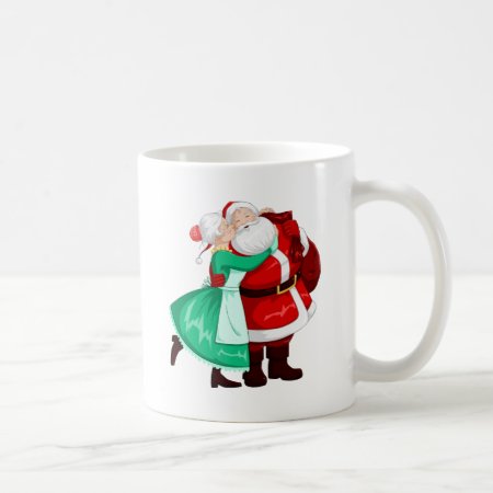 Mrs Claus Kisses Santa On Cheek And Hugs Coffee Mug
