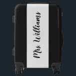 Mrs. Personalized Black and White Carry On Luggage<br><div class="desc">Elegant black script personalized with Mrs. and your new last name,  on a white background accents this carry on luggage,  making it perfect for the new bride on her honeymoon,  and all future travels. Check out the coordinating larger luggage size,  that says more Mrs. and the coordinating Mr. luggage.</div>