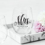 Mrs. script personalized newlywed bride stemless wine glass<br><div class="desc">A perfect gift for the bride-to-be or a keepsake honeymoon item. This wine glass features a modern calligraphy Mrs. in black with a spot for her new last name and an established date. Great bridal shower or bachelorette gift! Find more matching items in the collection by Lea Delaveris Design.</div>