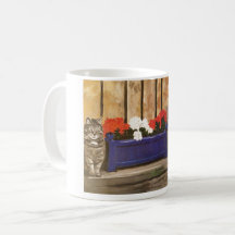 Mug featuring cat and flower box