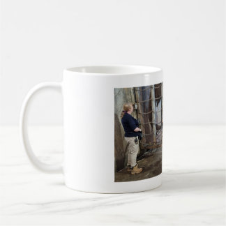 Mug with a picture of a lady and an Elephant.