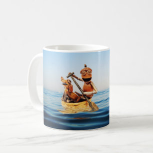 Mug with acorn elf in the boat on the sea