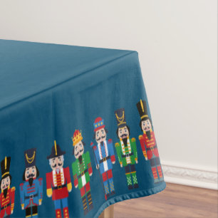 Multi-colored Nutcrackers on Bluegreen Background Tablecloth