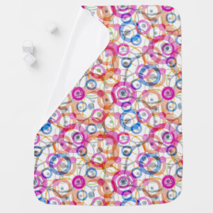 Multi-colored polka dots, circles on a white baby blanket