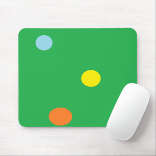 Multicolor circles on green mouse pad