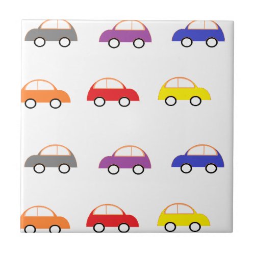 Multicolor mini cars on white ceramic tile