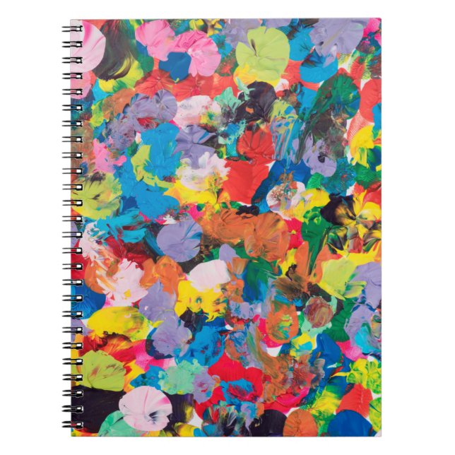 multicolor stained background made with paintbrush notebook (Front)