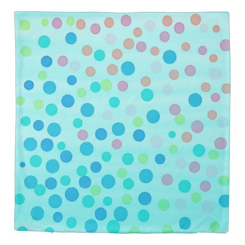 Multicolored dots on blue duvet cover